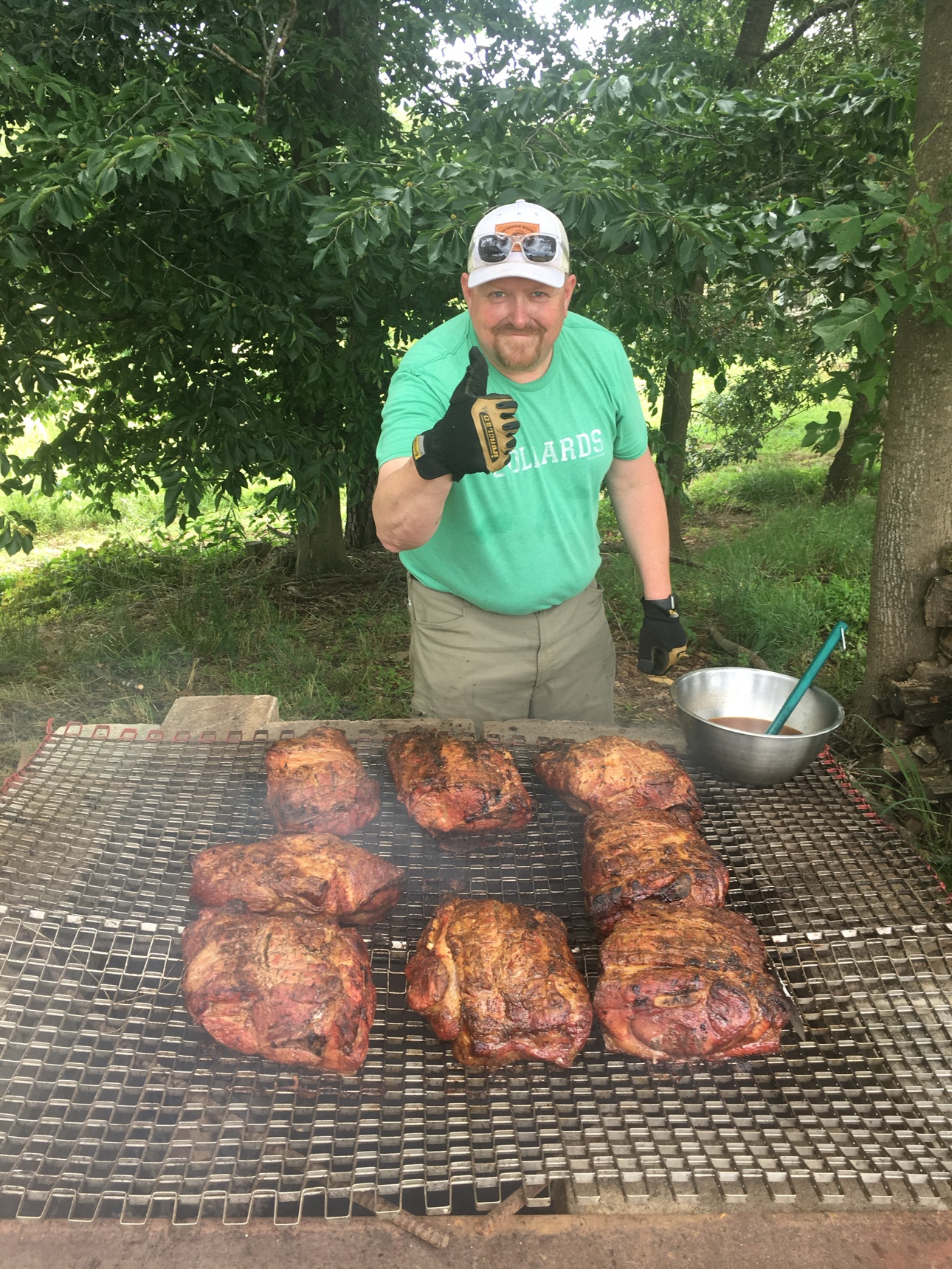 Man grilling pasture-raised pork